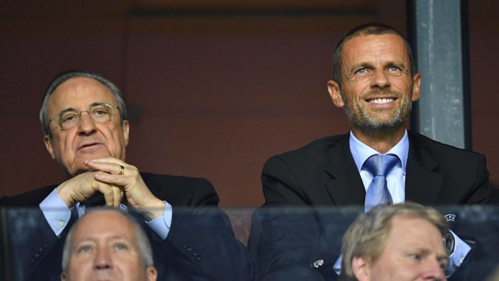 Florentino Pérez y Aleksander Ceferino, durante un partido del Madrid en Champions.