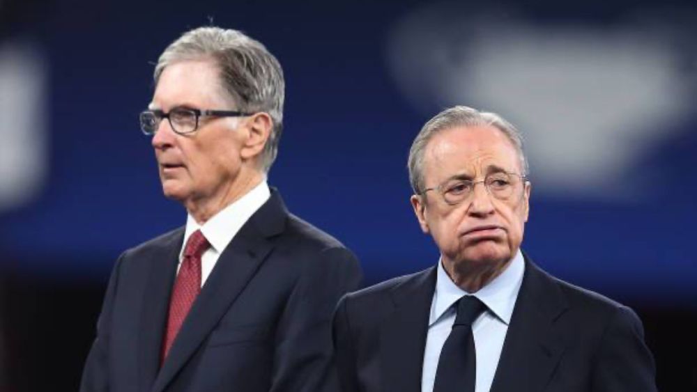 John W. Henry, propietario del Liverpool, y Florentino Pérez, presidente del Real Madrid.