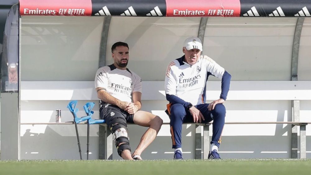 Dani Carvajal y Carlo Ancelotti, en la Ciudad Deportiva de Valdebebas.